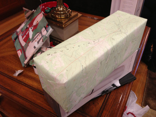 jessk:

My uncle (a civil engineer) wrapped our gifts in maps from his work.
