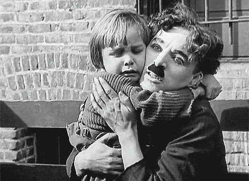Charlie with Jackie Coogan in The Kid c.1921 

