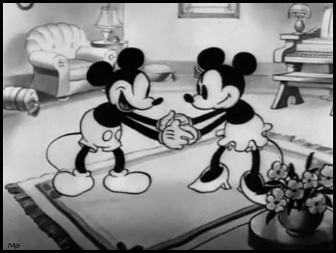 Mickey and Minnie Mouse smooch in “Puppy Love” (1933) - Walt Disney
