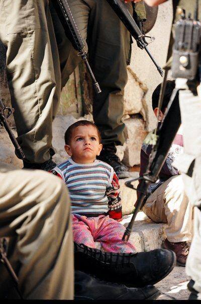 israelwc:

Little Palestinian Child watching Occupying Soldiers…How will the children in Palestine grow up? FB.com/Israelwc
