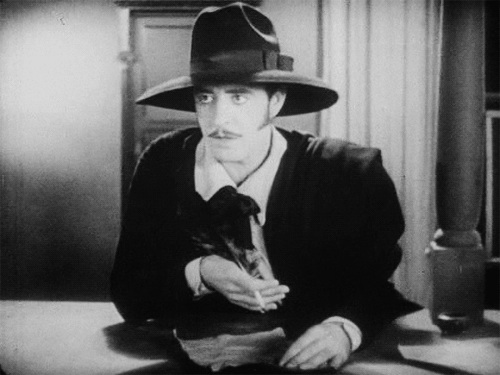 littlehorrorshop:

John Gilbert and his hat in La Bohème, 1926