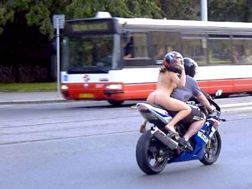 I believe that the photoset was taken in Rumania; the girl was fined for not wearing a helmet :) 