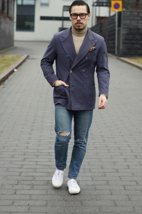 Blue blazer combined with light brown knitwear