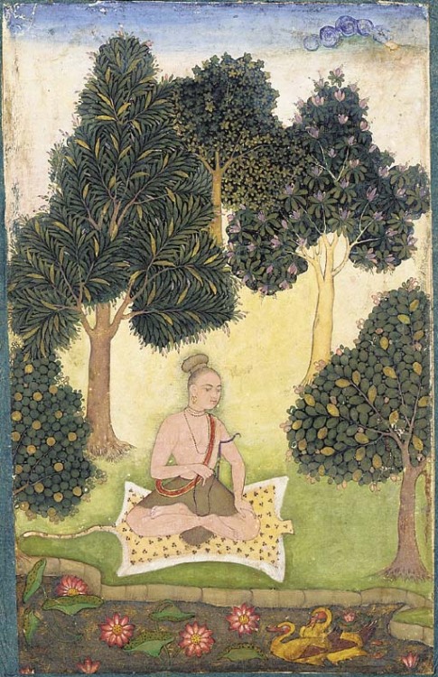 A yogi seated in a garden, North Indian or Deccani miniature painting, c.1620-40