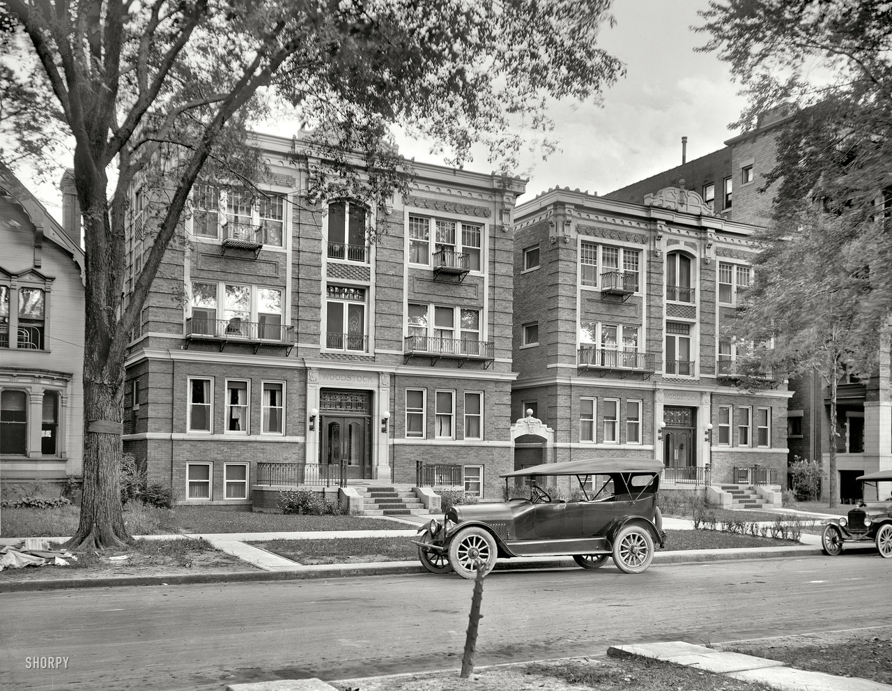 A car parked outside of the Woodstock Apartments... | Old Detroit ...