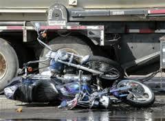 Back of semi truck motorcycle crash