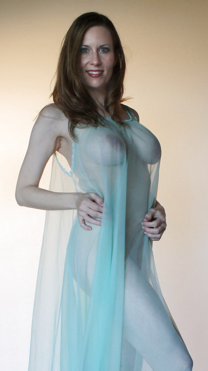Big Mature Brunette Breasts In See Through Blue