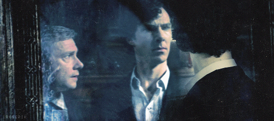 Sherlock finds the mirror of the erised and as he looks into it he sees John step up behind him.
