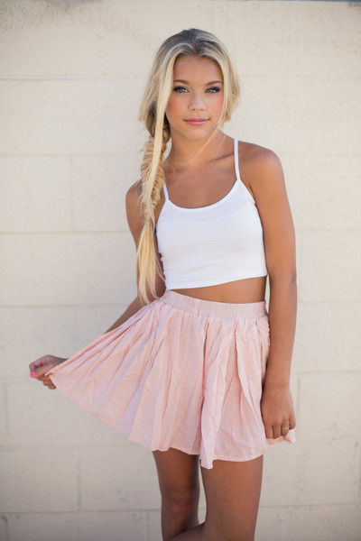 Girl in white mini skirt