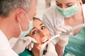 Mature dental assistant