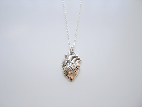 revoult: Heart NecklaceA beautifully intricate sterling silver heart shown anatomically correct is strung on a dainty sterling silver chain. A perfect every day necklace to be worn alone or layered. i want this so badly 