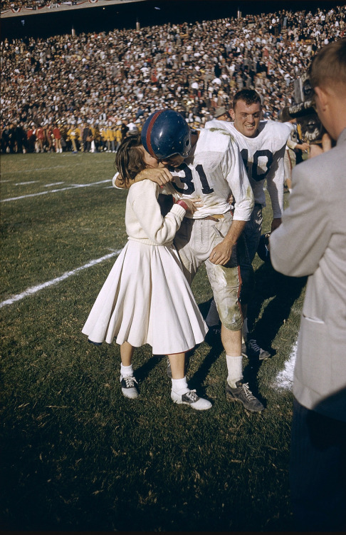 sarahspy: A victorious University of Mississippi player being kissed by a cheerleader after the Cotton Bowl (1956) (via) 