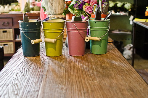 pastel buckets on table