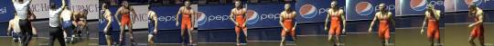 spylizard:  Overly-excited college wrestler stretches-out his singlet with a cute