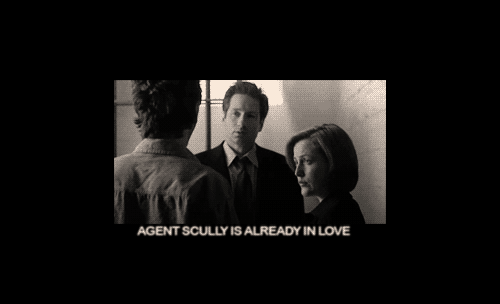  Padgett: In my book, I’d written that Agent Scully falls in love but that’s obviously impossible. Agent Scully is already in love. Its not in this gif but I love how Mulder’s eyes dart back and forth between Padgett and Scully when Padgett says Scully is already in love. I can’t really read it but he looks confused or maybe surprised.