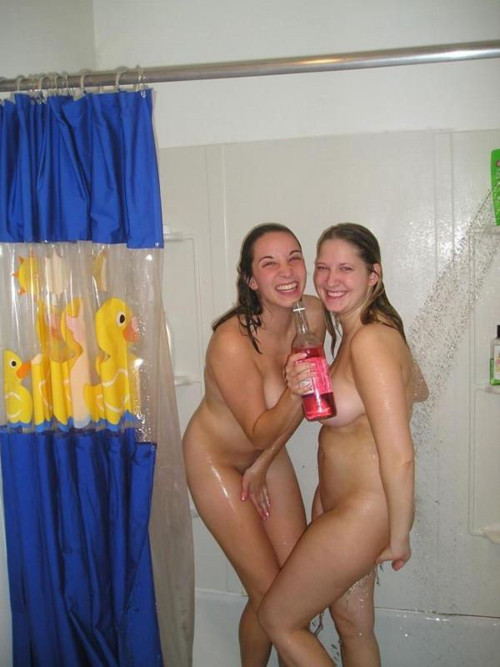 Nude girls taking showers together
